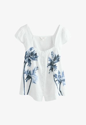 Fehér lenvászon blúz rövid, fodros ujjakkal, kék pálmalevél mintával és gombos elülső résszel. Strukturált anyag, laza szabás.