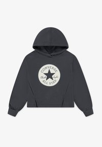 Tamsiai pilkas trumpintas medvilninis džemperis su dideliu apskritimu baltu logotipu, kuriame yra žvaigždė ir juoda užrašas „Converse All Star“.