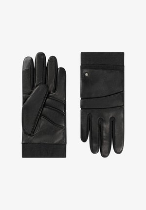 Gants en cuir noir avec une texture lisse, présentant un design structuré, des doigts effilés et un poignet côtelé. Agrémentés de subtils détails de couture.