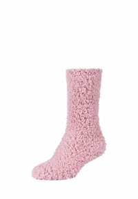 Calzini rosa morbidi realizzati in tessuto soffice e texturizzato. Design fino al ginocchio con un colore uniforme e punta arrotondata.