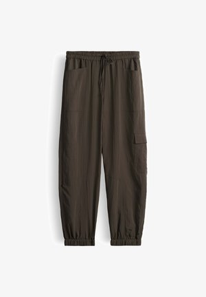 Dunkel olivgrüne Cargohose mit elastischem Bund, Kordelzug, seitlichen Taschen und elastischen Bündchen.