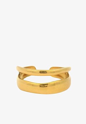 Anello doppio in oro con una superficie liscia e lucida e un design arrotondato, caratterizzato da bande incrociate per un aspetto elegante.