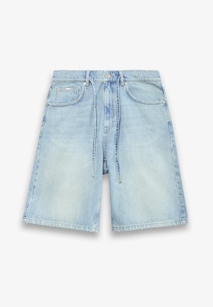 Heledad sinine teksapüksid, millel on mugav lõige, nööriga vöökoht, viis taskut ja kerge fade'iga kangal.