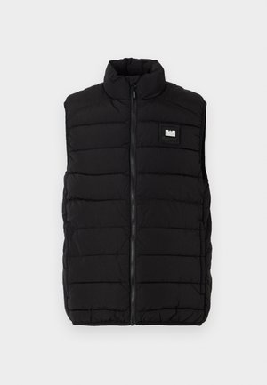 Black puffer vest with a high collar, featuring horizontal quilted pattern, front zipper closure, and a rectangular logo patch on the chest.
