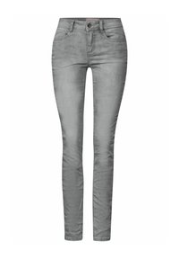 Harmaat farkut, joissa on ohut rakenne, viisi taskua ja edessä nappisuljenta. Ominaisuuksiin kuuluu hienovarainen haalistuminen ja kapea malli.