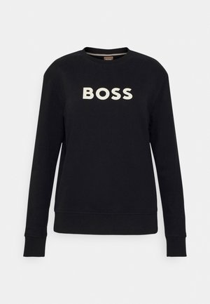 Czarna bluza wykonana z bawełny, z długimi rękawami i okrągłym dekoltem. Posiada logo "BOSS" w kolorze białym na przodzie, minimalny design.