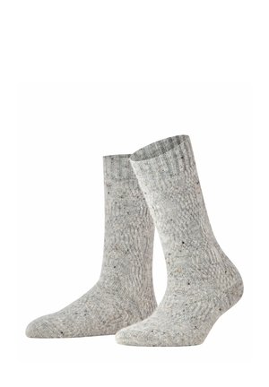 Paire de chaussettes grises mi-mollet en mélange de laine avec un motif à côtes et de petites touches de couleur sur toute la surface.