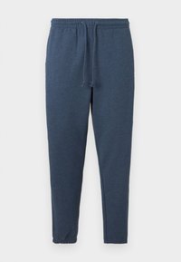 Pantaloni de trening tapered, de culoare bleumarin, cu talie elastică și șnur, având manșete elastice la glezne.