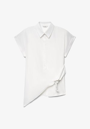 White short-sleeve asymmetrical blouse with collar, front buttons, and a side tie detail on a plain background.
