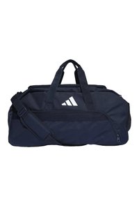 Marine duffelbag met dubbele handvatten en een verstelbare schouderband. Bevat een groot hoofdvak en een zijvak met rits, verfraaid met een wit logo.