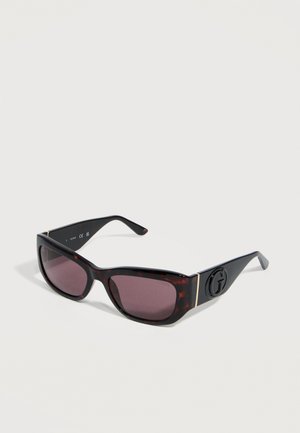 Rectangular tortoiseshell sunglasses with dark purple lenses and black arms featuring a raised circular "G" logo on the sides.