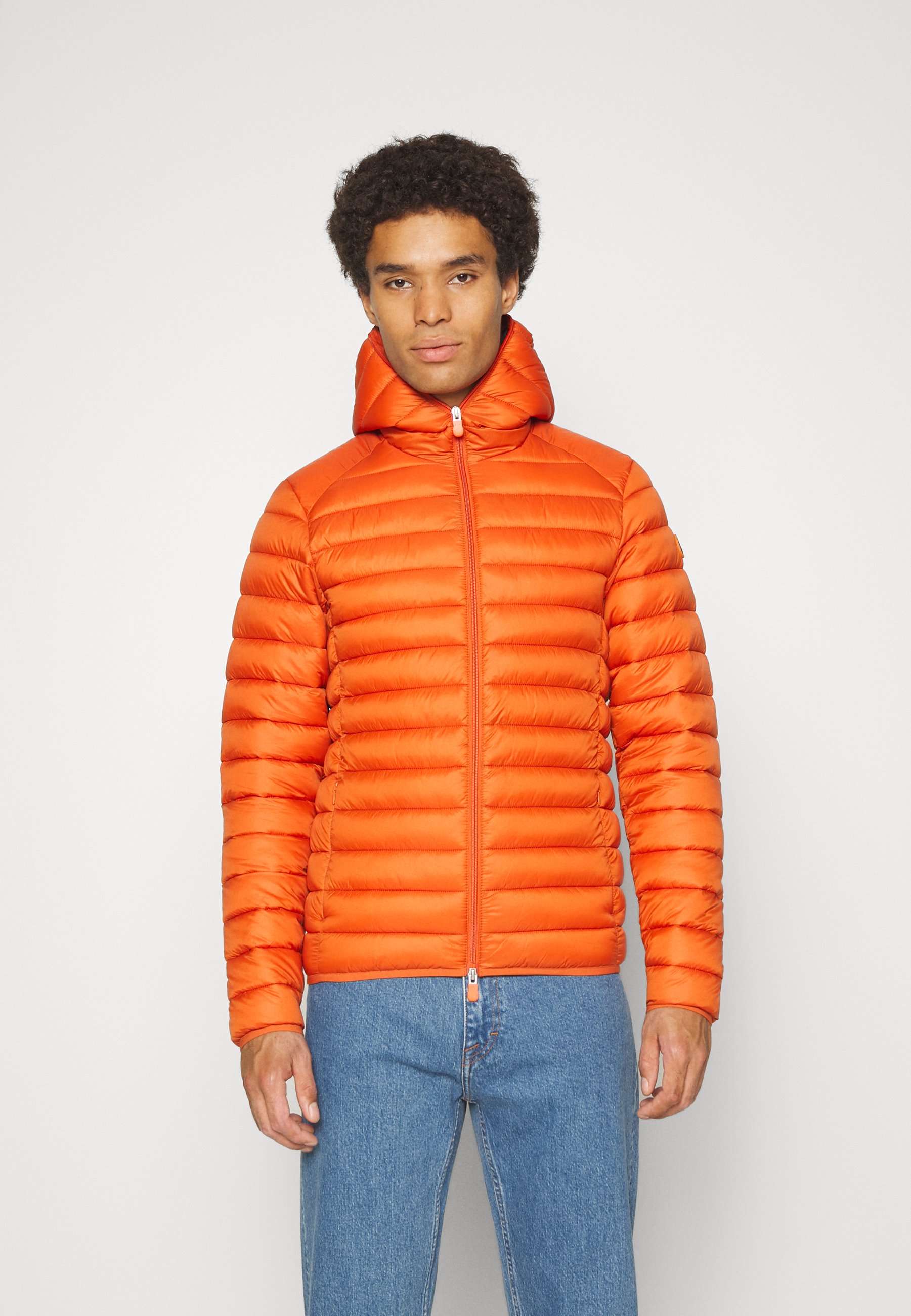 light orange puffer jacket