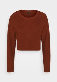 Maglione corto color ruggine con maniche lunghe, texture a coste e scollatura tonda. Realizzato in materiale lavorato a maglia.