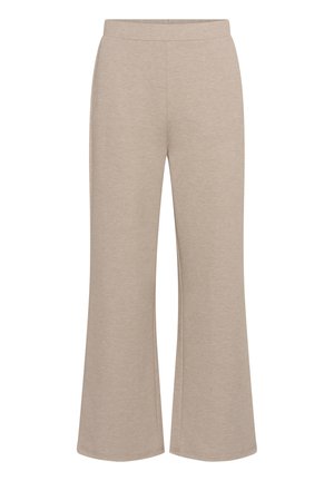 Bēša, zvana stila sporta bikses no mīksta kokvilnas maisījuma ar elastīgu jostasvietu un gludu tekstūru, ar taisnu griezumu līdz potītēm.