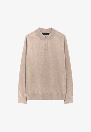 Beige Pullover-Sweatshirt mit hohem Kragen und Halbzip-Verschluss. Mit Raglanärmel und elastischen Bündchen sowie Saum. Glatte Stricktextur.
