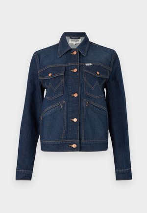 Veste en denim foncé au design court, présentant des boutons en cuivre, deux poches poitrine, des poches latérales et des accents de surpiqûre orange.