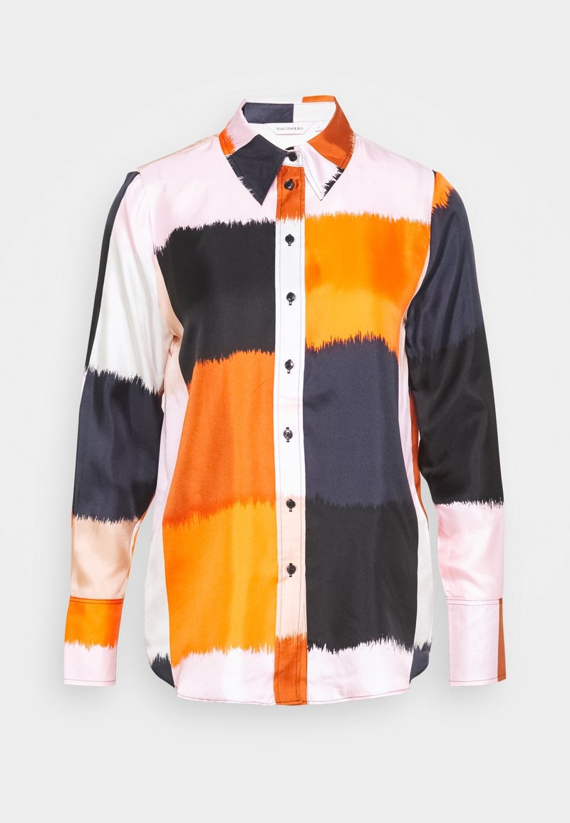 Chemise boutonnée multicolore avec des rayures orange, noire, blanche et rose. Confectionnée en tissu lisse, à manches longues et avec un col classique.