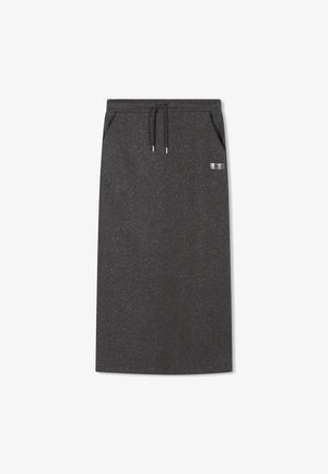 Long, dark gray skirt made of sparkly fabric with a drawstring waistband and two side pockets. Features a small branded accent on the side.