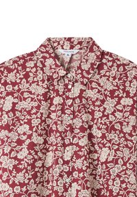 Camicia rossa a fiori con bottoni, realizzata in tessuto leggero. Presenta un colletto, un motivo floreale in crema e una vestibilità comoda. Adatta per un abbigliamento informale.