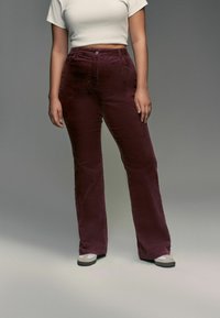 Next HOURGLASS FLARED - Housut - berry red