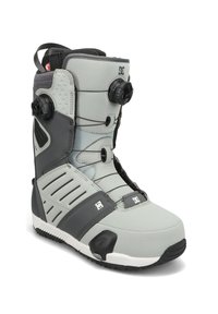 Grauer Snowboardstiefel mit strukturiertem Obermaterial, schlankem Design, verstellbarem Schnürsystem und schwarzer Gummisohle. Mit DC-Logo.