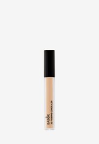 Babor 3D Firming Concealer in a clear plastic tube with a black cap, featuring a light beige tint and black text on the side.