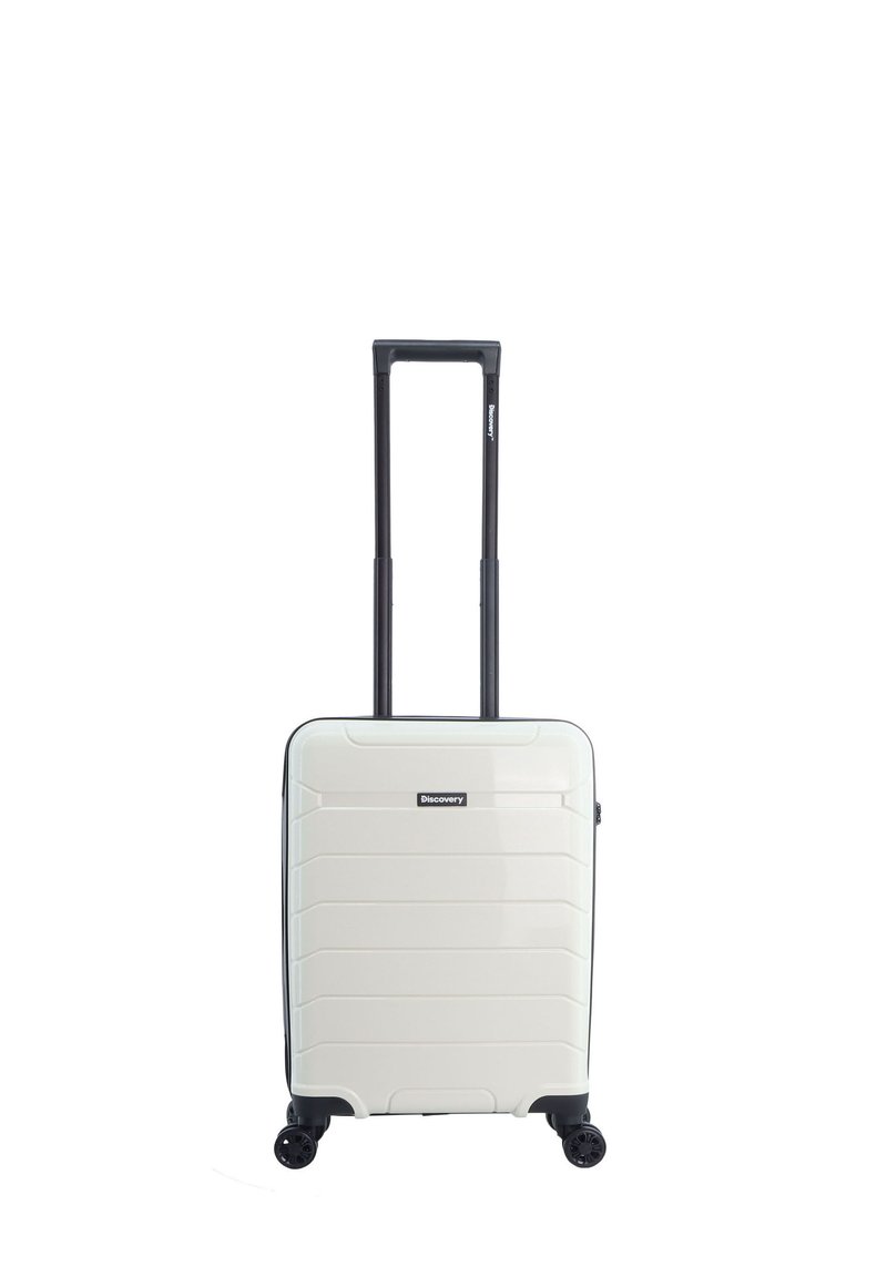 White hardshell suitcase with horizontal grooves, retractable black handle, four black wheels, and a front logo accent.