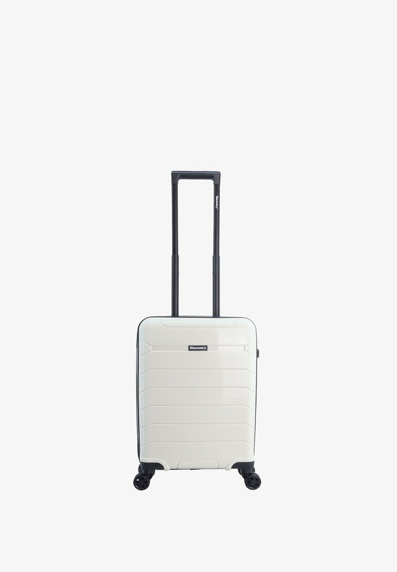 White hardshell suitcase with horizontal grooves, retractable black handle, four black wheels, and a front logo accent.