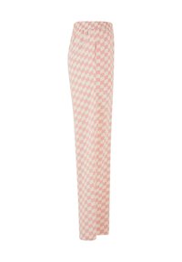Pink and white checkered loose-fit pants with an elastic waistband shown from the side on a white background.