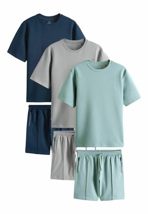 Three sets of solid color casual t-shirts and matching shorts in navy blue, light gray, and light teal with zipper pockets.