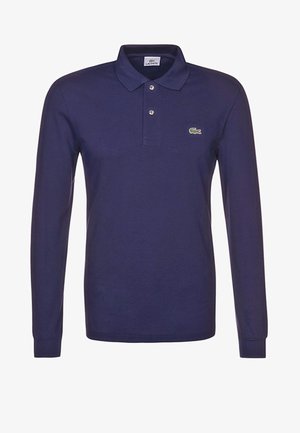 Langærmet navy polo shirt i bomuld, med en tre-knaps placket og et broderet grønt krokodille-logo på venstre bryst.