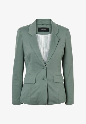 Žalias švarkas iš medvilnės mišinio audinio su pritaikytu kirpimu, su nupjautomis atlapomis, dviem priekinėmis kišenėmis ir sagų užsegimu. Viduje su pamušalu.