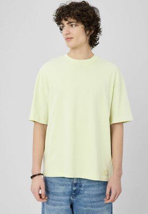 UNI ET LOGO - T-shirt basique - jaune