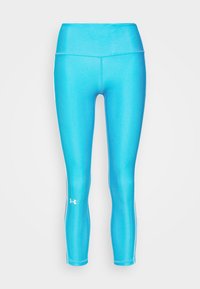 Niebieskie legginsy sportowe o błyszczącej powierzchni, z wysokim stanem, długości do kostek oraz małym białym logo na dolnej części nogawki.