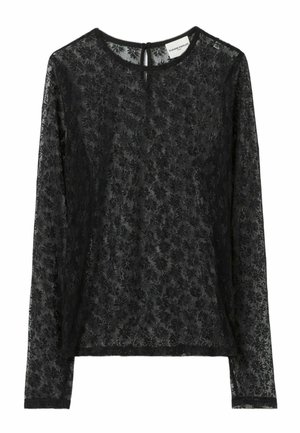 Haut en dentelle noire à manches longues avec des motifs floraux, col rond et fermeture en trou de serrure au dos. Tissu doux et texturé.