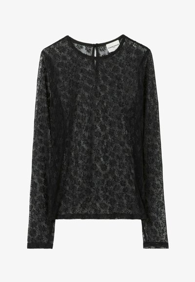 Top lungo in pizzo nero con maniche lunghe, caratterizzato da un motivo floreale, scollo rotondo e chiusura a goccia sul retro. Tessuto morbido e testurizzato.