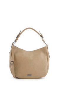 Sac à main en cuir beige avec surface texturée, forme ronde, bandoulière ajustable et accents en métal argenté. Nom de la marque affiché à l'avant.