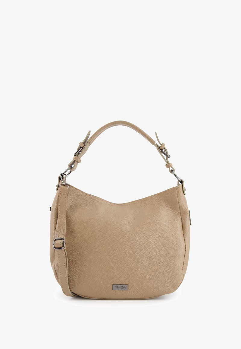 Beige leather shoulder bag with textured surface, a rounded shape, adjustable strap, and silver hardware accents. Brand name displayed on front.
