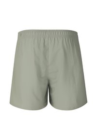Shorts à taille élastique gris clair au design simple, vus de dos sur un fond blanc.