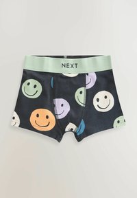 Boxer neri con un motivo di faccine colorate, dotati di un elastico verde menta etichettato "NEXT". Tessuto morbido.