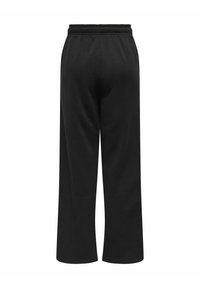 Sorte vidde sweatpants med elastisk talje og sidelommer. Blødt, glat stof med et simpelt, uprydet design.