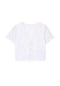 Blouse blanche courte avec motif en dentelle, manches courtes, décolleté en V profond et détail de nouage à l'avant, avec des bords festonnés.