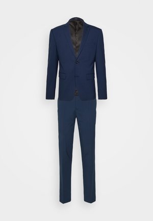 Navy blue suit consisting of a single-breasted blazer with flap pockets and matching trousers, made from smooth fabric with a sheen.