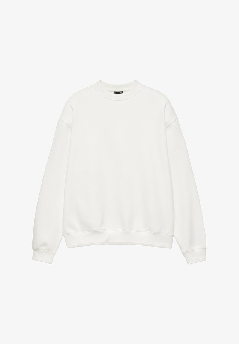 Sweat-shirt blanc uni à manches longues et col rond, avec poignets et ourlet côtelés, présenté sur fond blanc.