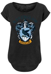 Svart T-skjorte med løs passform, med et Ravenclaw-våpen i blått og sølv, inkludert en ravn og utsmykkede detaljer.