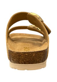 Brown cork footbed sandal with two thin leather straps, gold buckle detail, and a textured footbed. Features a white rubber sole.