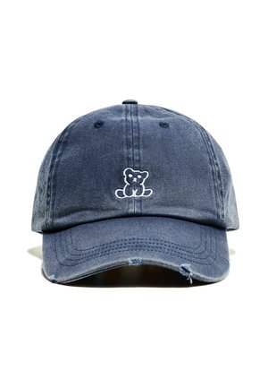 Blue cotton baseball cap featuring a white embroidered bear design on the front, with a curved brim and distressed detailing.