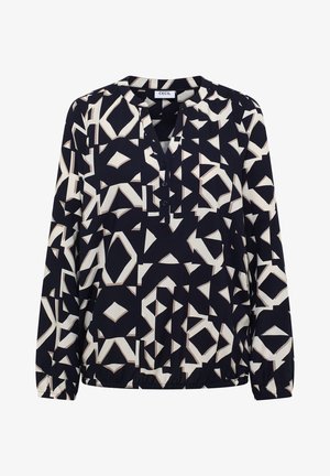 Blouse bleu marine avec un motif géométrique crème. Comprend un décolleté en V, une patte de boutonnage et un ourlet élastique. Manches longues avec poignets froncés.