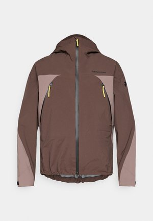 Jachetă maro rezistentă la intemperii cu glugă, având accente gri deschis, fermoar central și două buzunare laterale cu fermoar cu manere galbene.