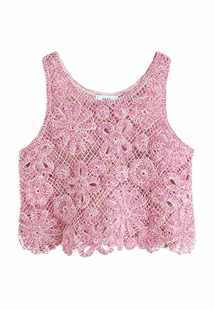 Pink crocheted sleeveless crop top with floral patterns and open mesh design, labeled "NEXT" at the neckline.